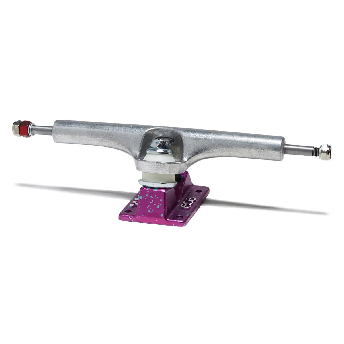 A skateboard truck with a silver metal hardware assembly and a bright purple powder-coated base plate, shown on a clean white background.