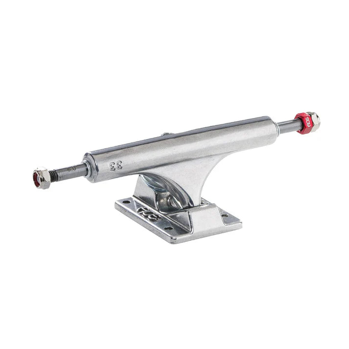 Chrome metal skateboard truck on a white background