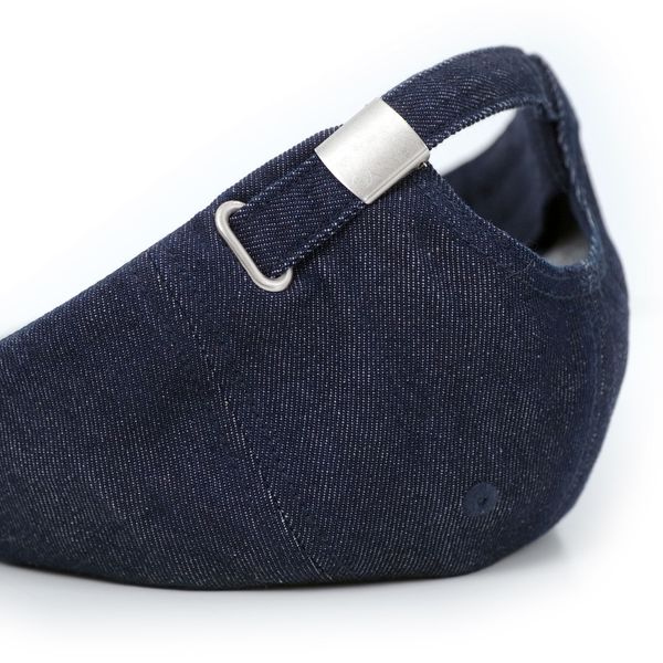 Navy blue cap with a silver buckle on a white background