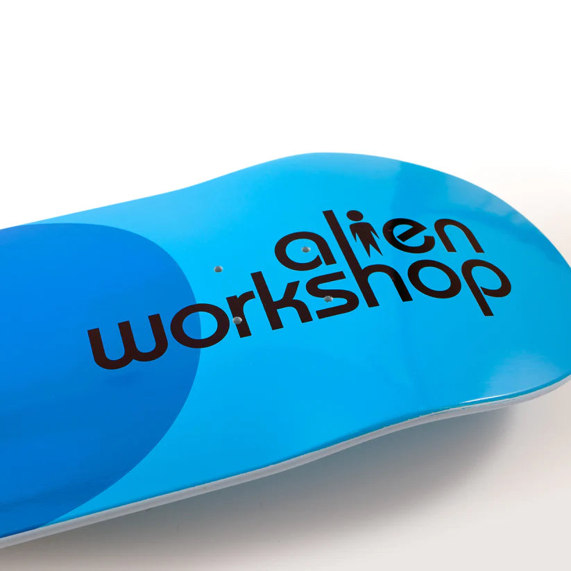 Blue skateboard deck with 'alien workshop' branding on a white background