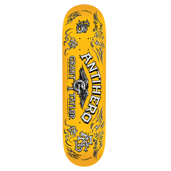 Yellow skateboard deck with black and white graphics on a white background