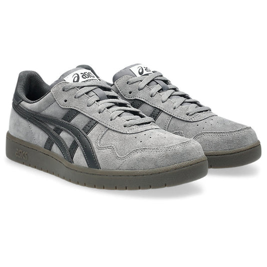 Pair of gray sneakers with black accents on a white background