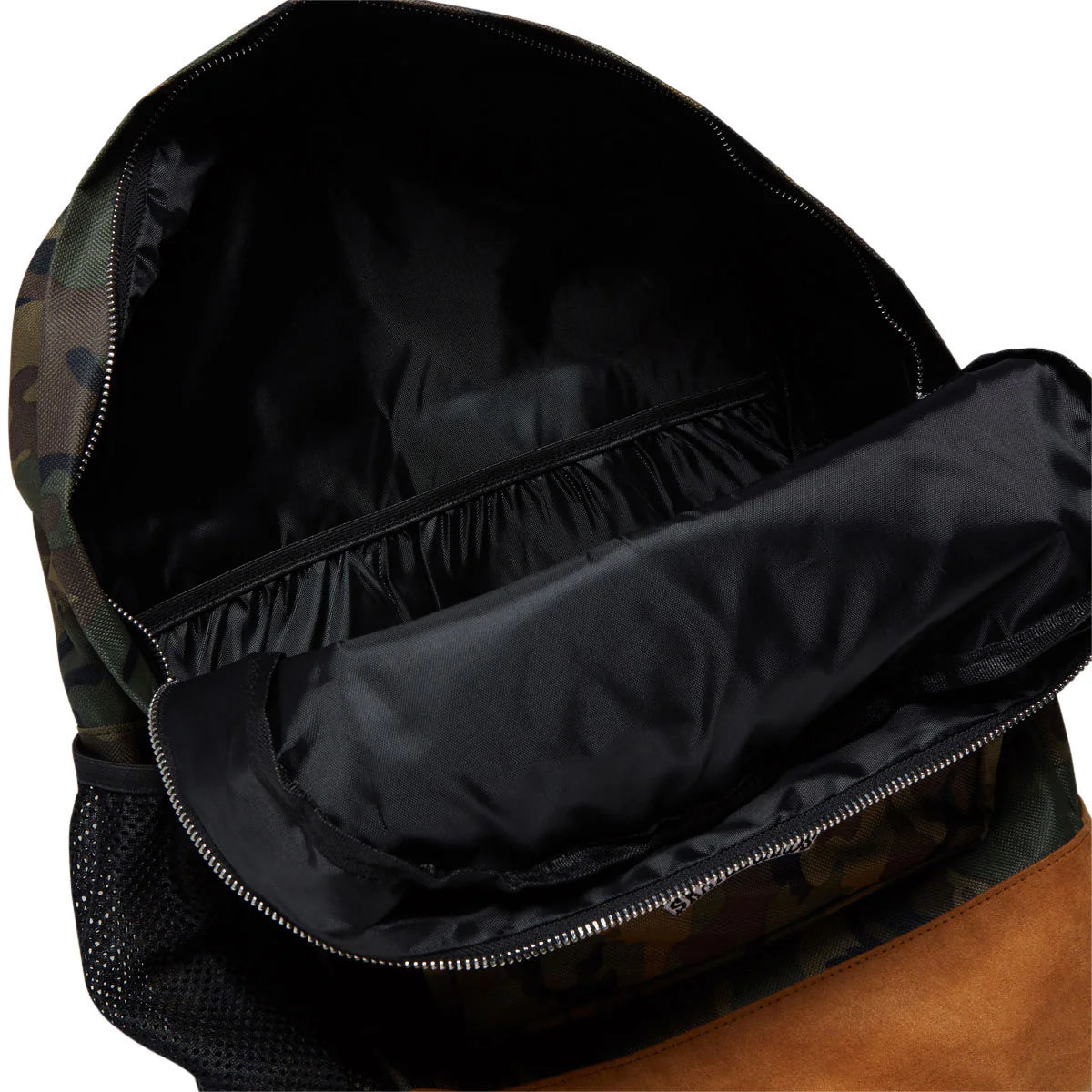 Open backpack showing a black interior with a zippered compartment, mesh side pocket, and camouflage-patterned exterior on a white background.