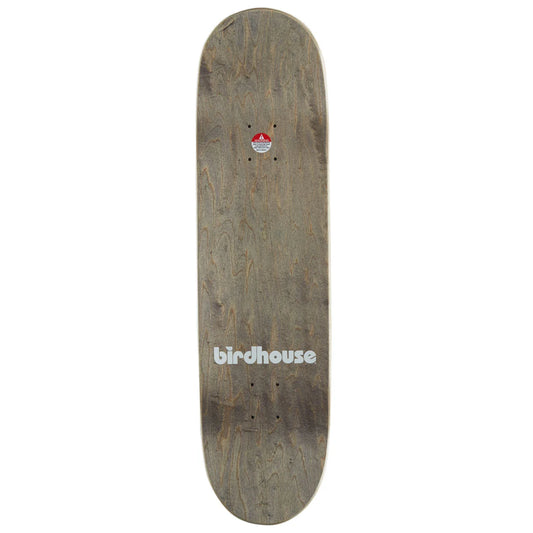 A Birdhouse skateboard deck with a weathered brown wood grain finish, featuring the white 'birdhouse' logo near the bottom and a small red and white graphic near the trucks.