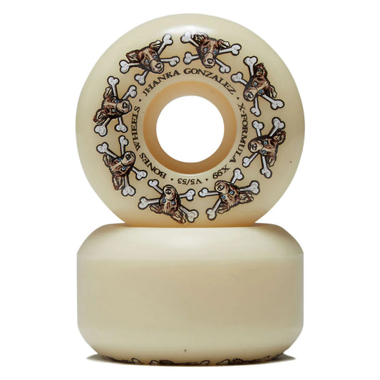 A cream-colored skateboard wheel stacked on top of another wheel, featuring a repeating brown and white skull and crossbones pattern with text reading 'MANKA GONZALEZ x FORMUL x DONKS' and '90/5/54'.