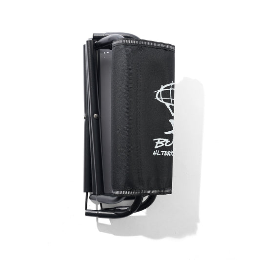 Black folding chair with a logo on a white background