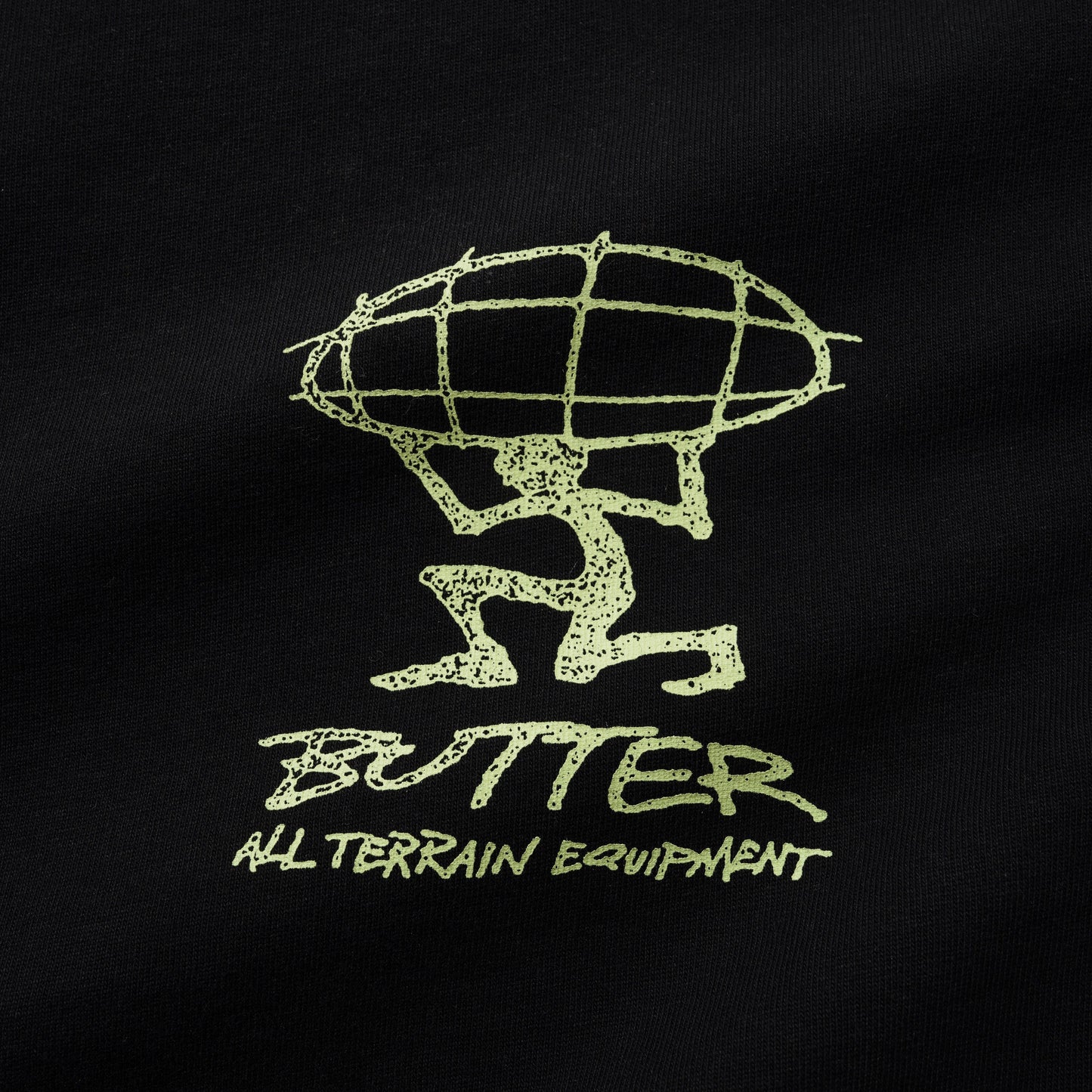 Glowing green logo on a black background