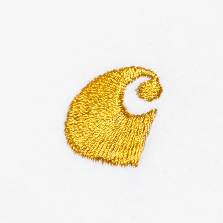 Gold carhartt logo patch on a white background