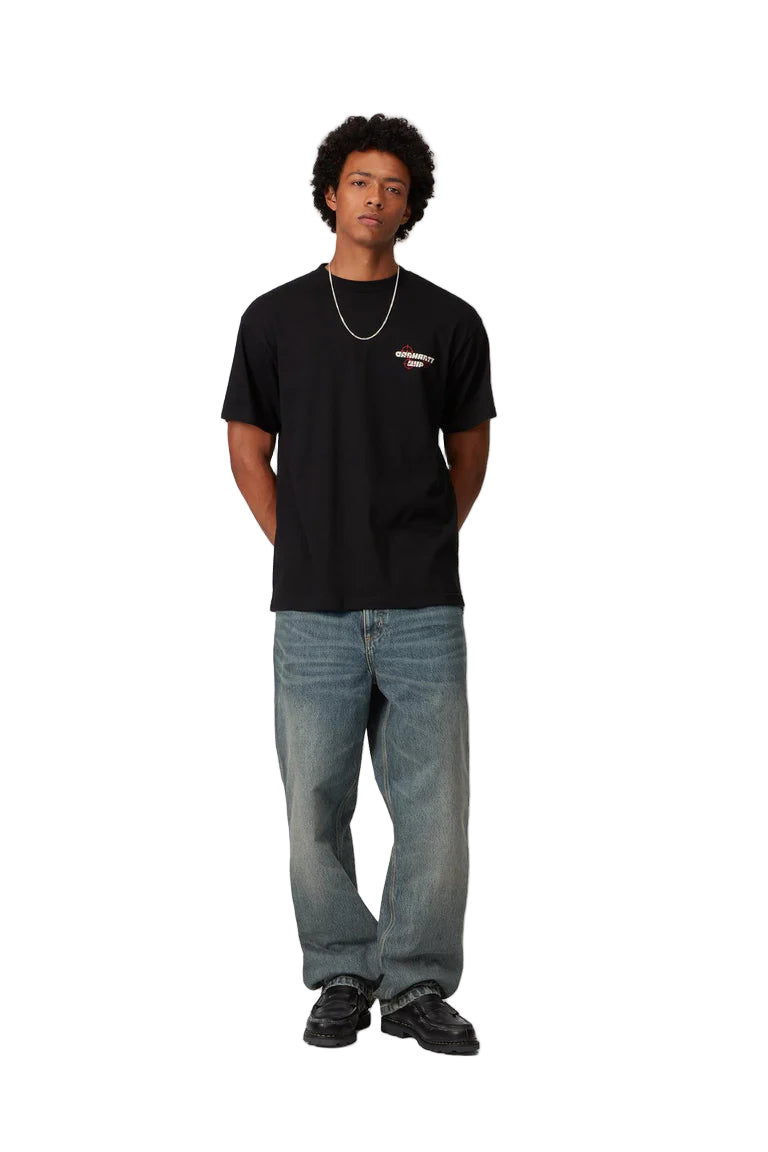 Person wearing a black t-shirt and blue jeans on a white background