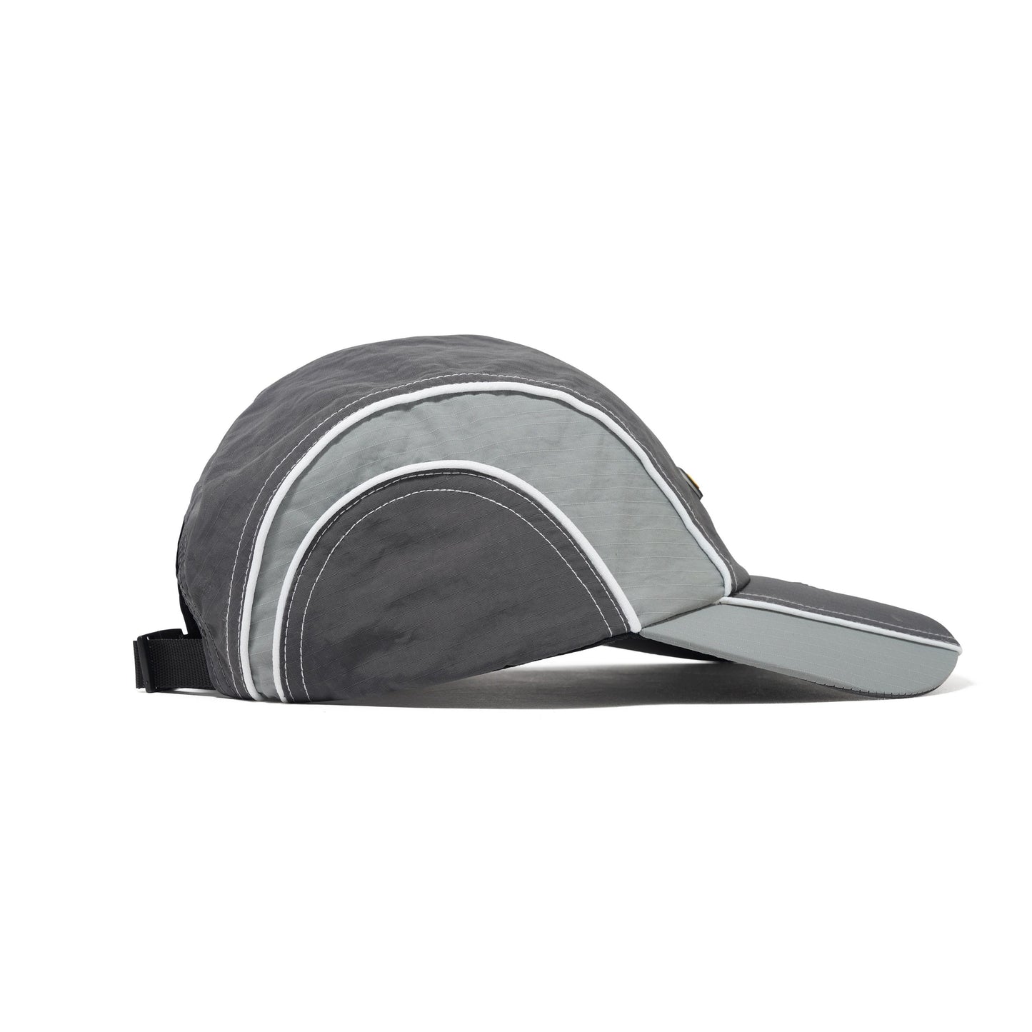 Gray visor cap with white accents on a white background