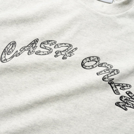 Grey sweatshirt with black text and a visible brand logo on a white background