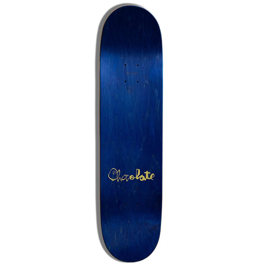 A skateboard deck with a dark blue to black gradient finish and a gold 'Chocolate' logo printed on the bottom, shown against a plain white background.