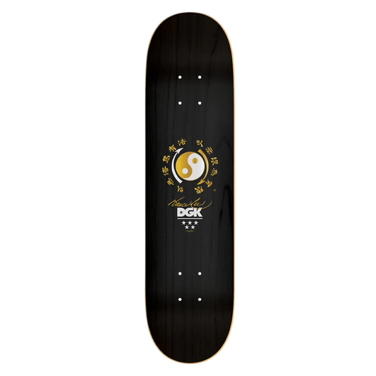 Black skateboard deck with a gold logo on a white background