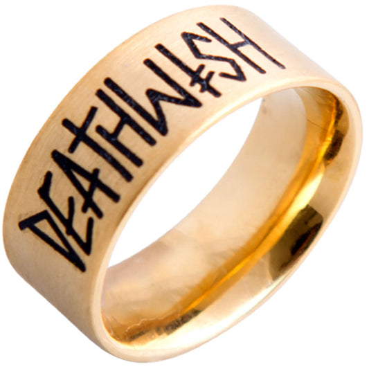 Gold ring with 'DEATH WISH' engraving on a white background