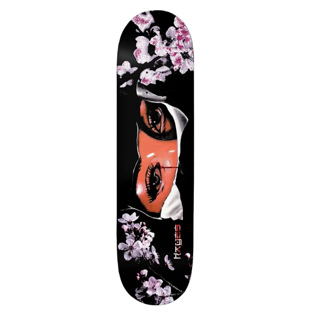 Skateboard deck with a design of an eye and cherry blossoms on a black background