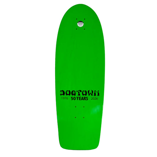 Green skateboard deck with 'Dogtown' branding on a white background