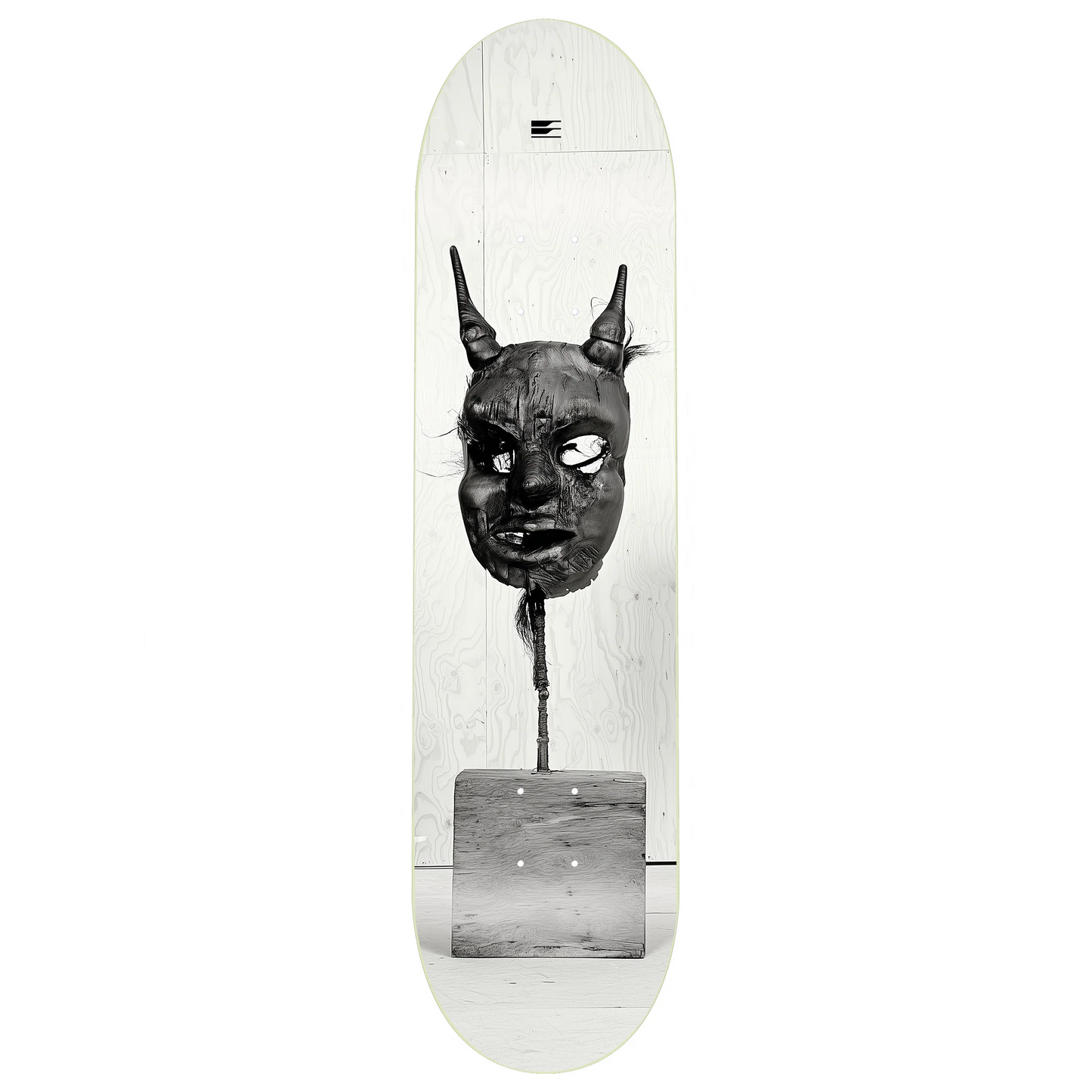 Skateboard deck with a black and white graphic of a mask on a white background
