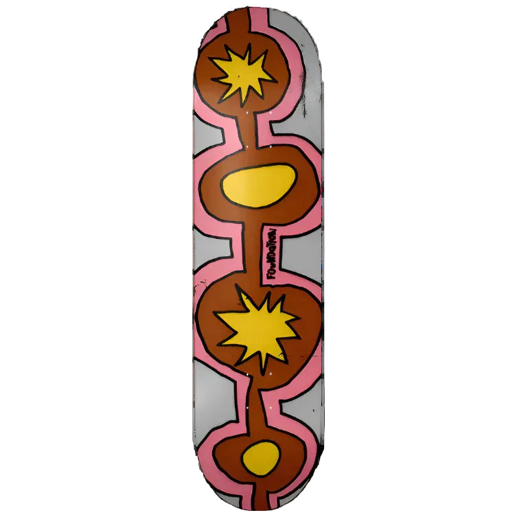 Skateboard deck with abstract design featuring stars and circles on a white background
