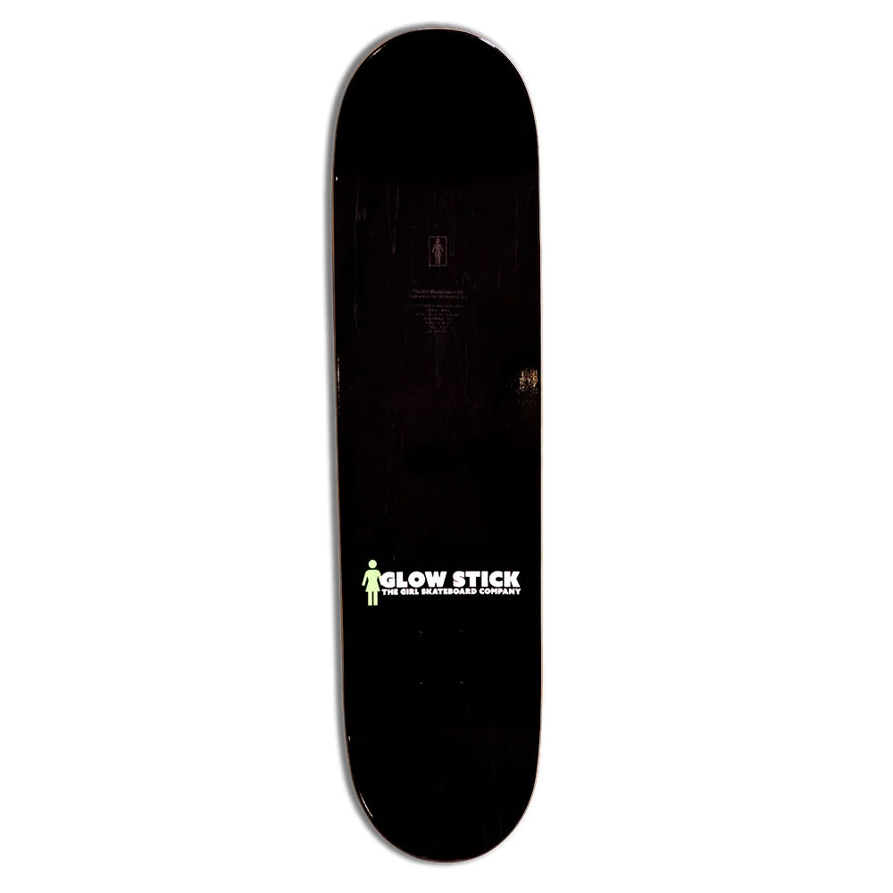 A black skateboard deck shown vertically against a plain white background, featuring a white and green 'GLOW STICK' logo near the bottom.