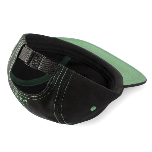 Black and green cap with a strap on a white background