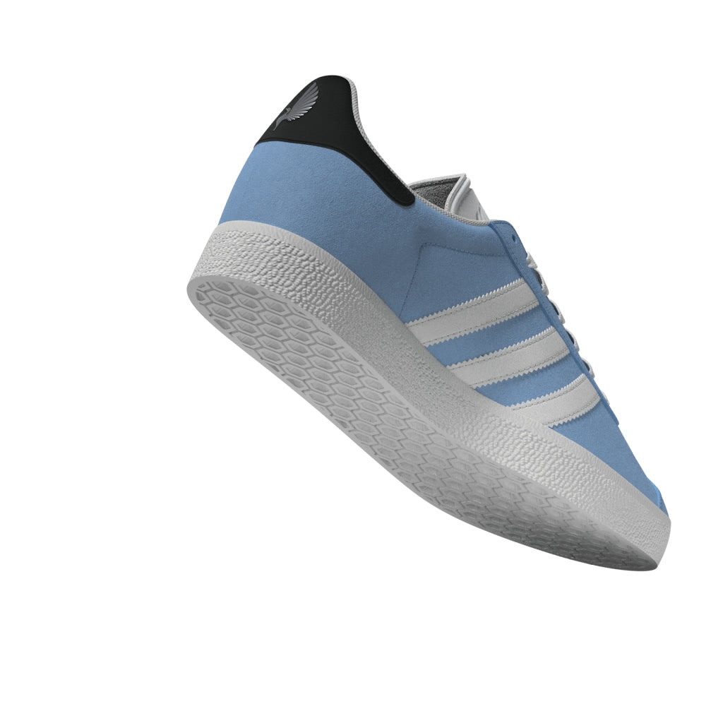 Zapatillas de skateboarding Adidas MNUFC x Familia Gazelle ADV Blanco Cristal Negro Carbono