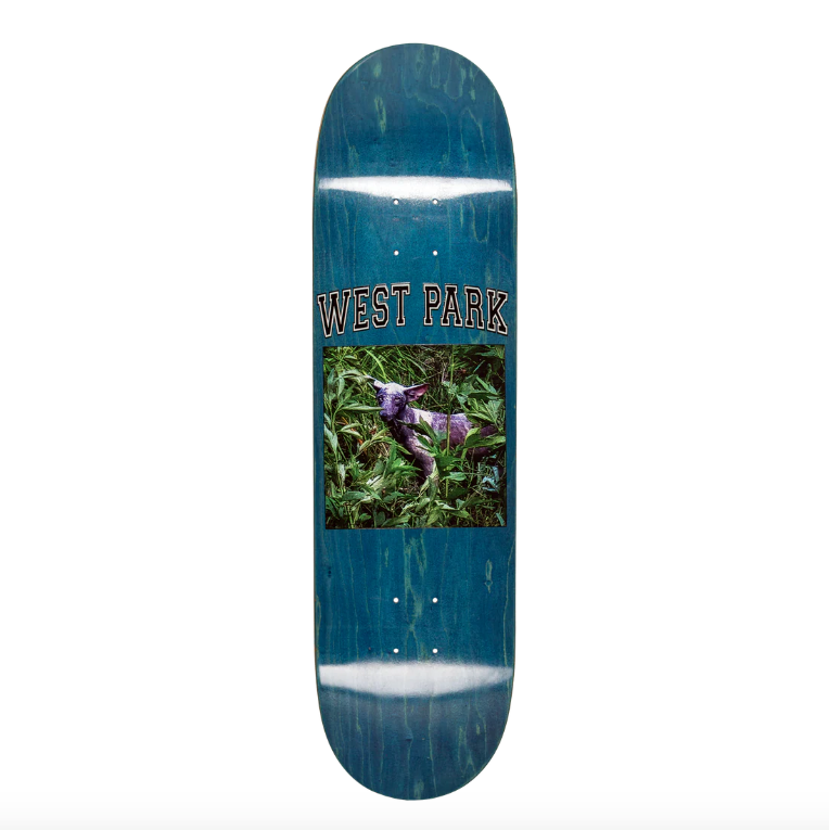Skateboard deck with 'West Park' branding and a graphic of a person in a grassy area.