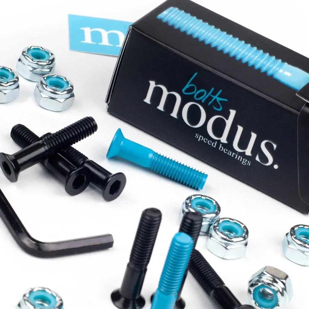 Modus skateboard hardware set with bolts and bearings on a white background