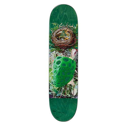 Skateboard deck with nature-themed design featuring a nest and green plant on a white background