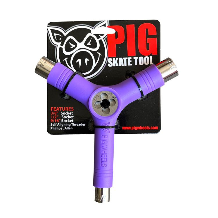 Purple T-shaped tool with 'PIG Skate Tool' packaging on a white background