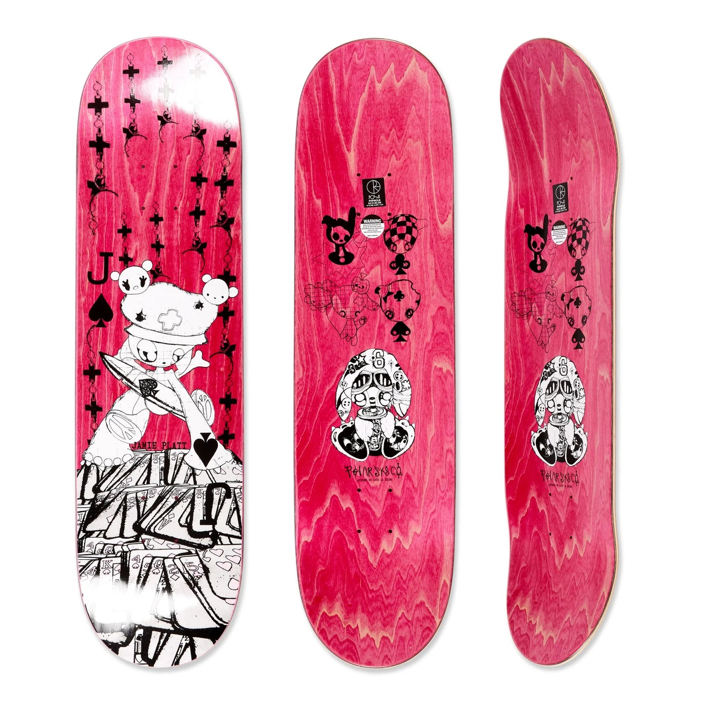 Three views of a pink skateboard deck with black and white graphics on a white background