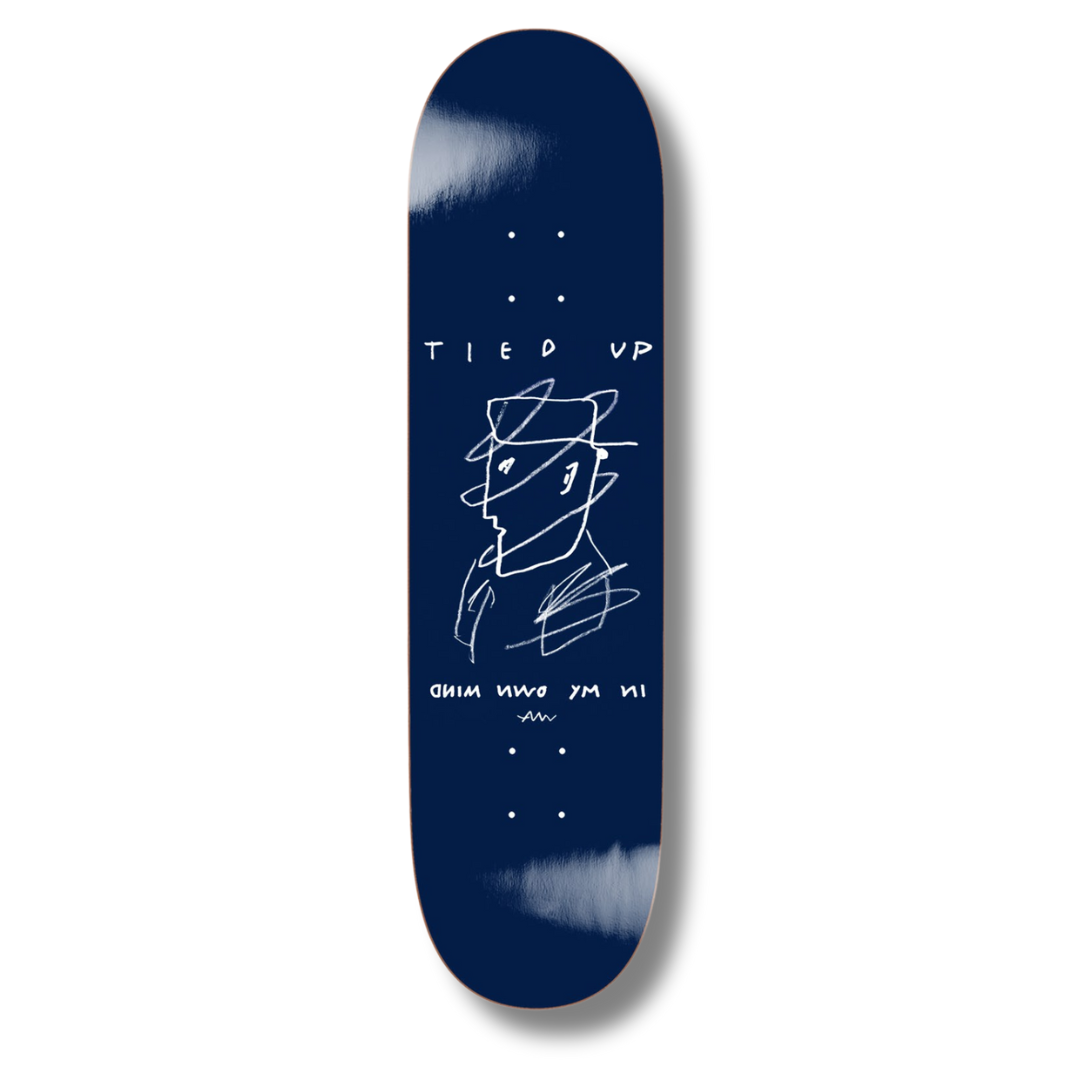Navy blue skateboard deck with white graphics and text on a white background
