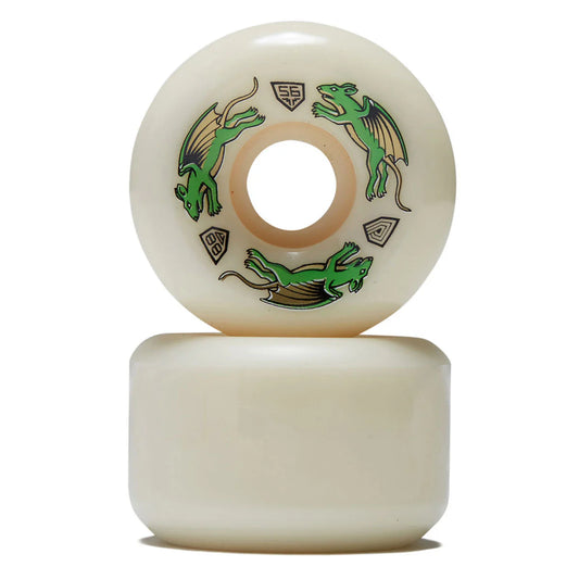 Two skateboard wheels with green dragon graphics on a white background
