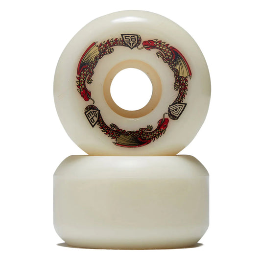 Two skateboard wheels with decorative design on a white background