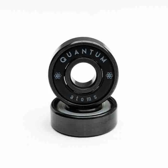 Two black bearings with 'Quantum' branding on a white background