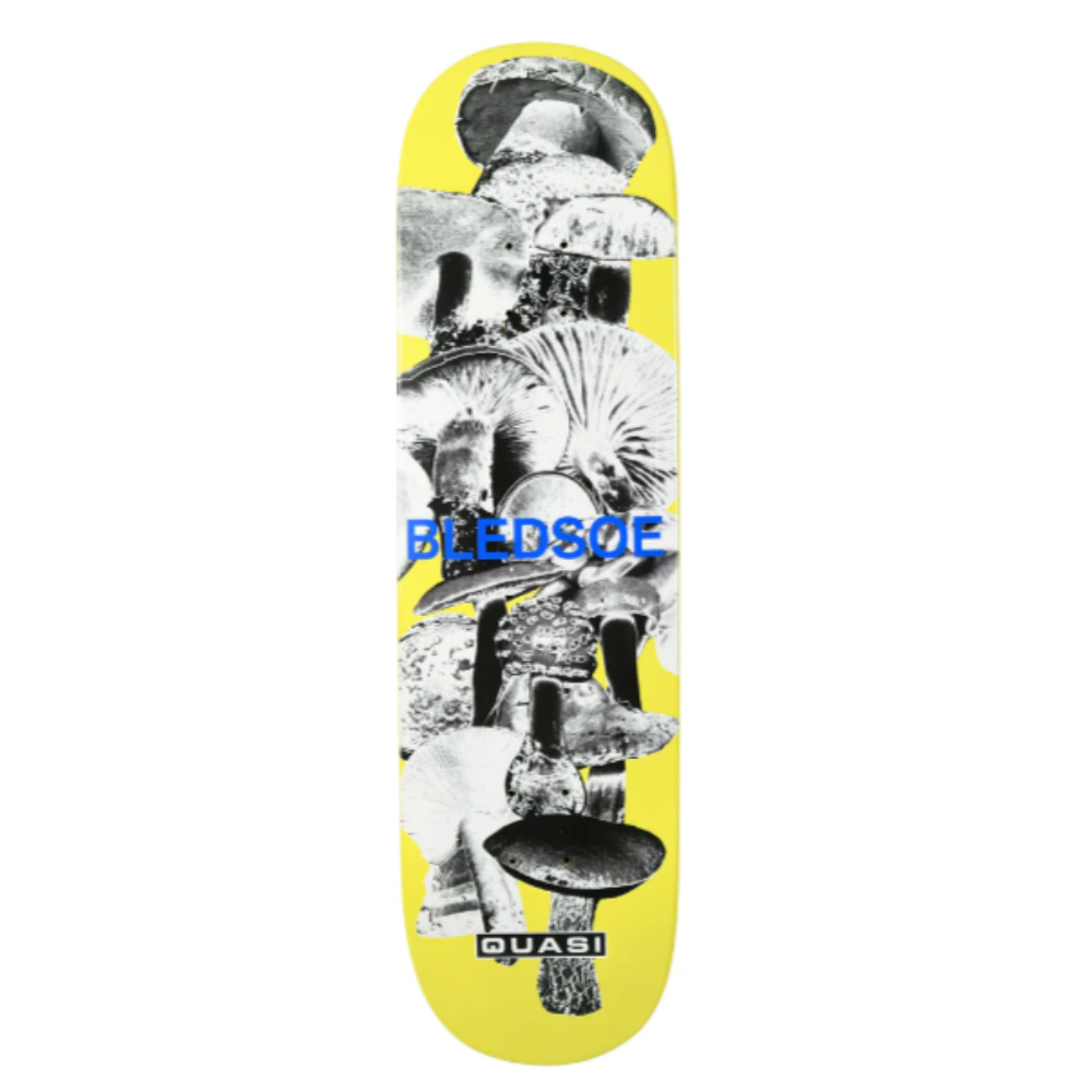 skateboard deck with mushrooms printed on it