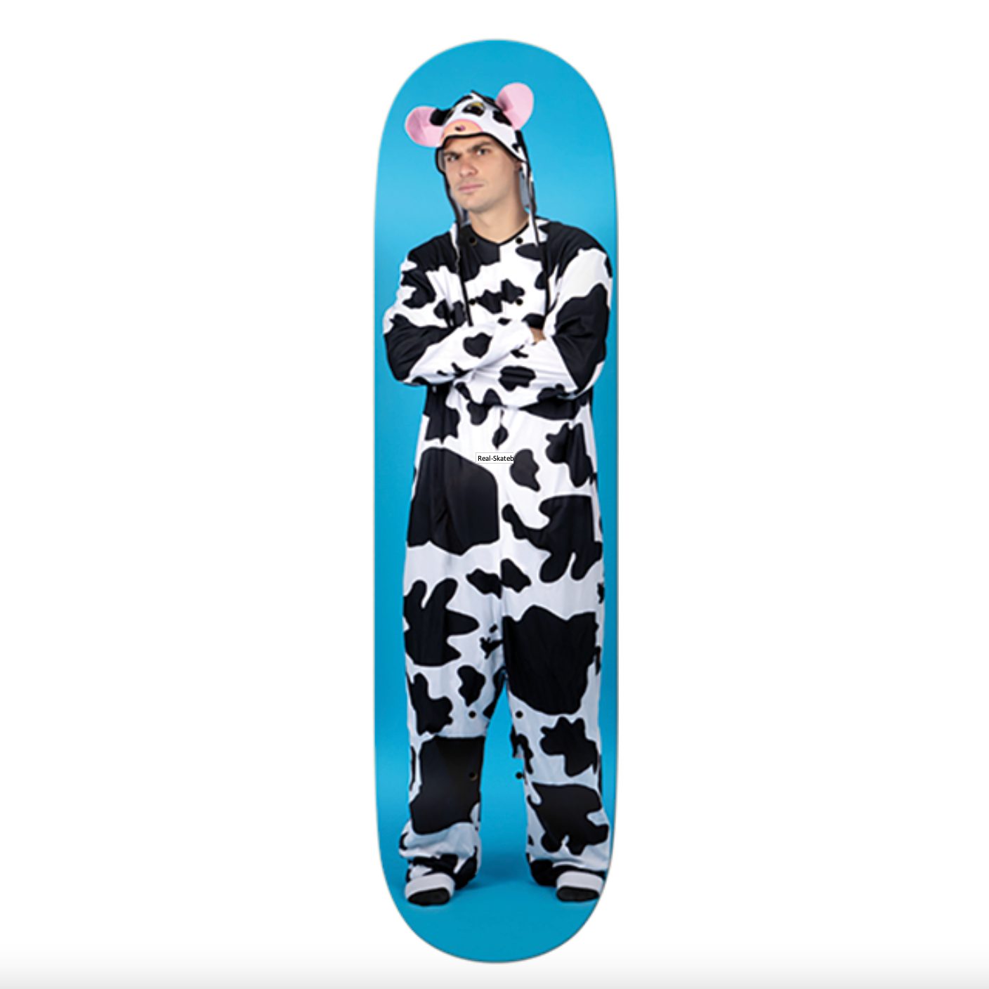 Person wearing a cow onesie standing on a blue skateboard deck.