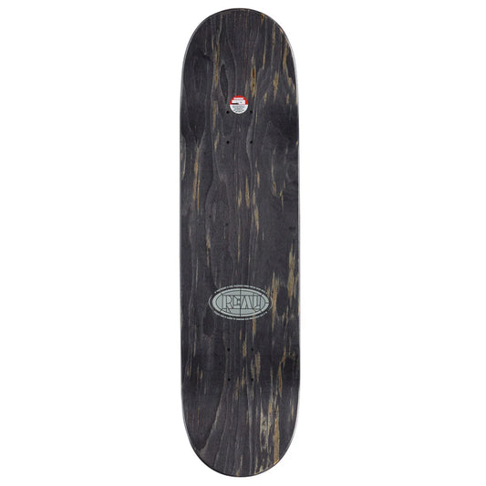 A skateboard deck shown from the underside, featuring a dark black wood grain pattern with natural brown and beige streaks. The deck has a silver oval logo in the center reading 'real' and a small red and white sticker near the nose.