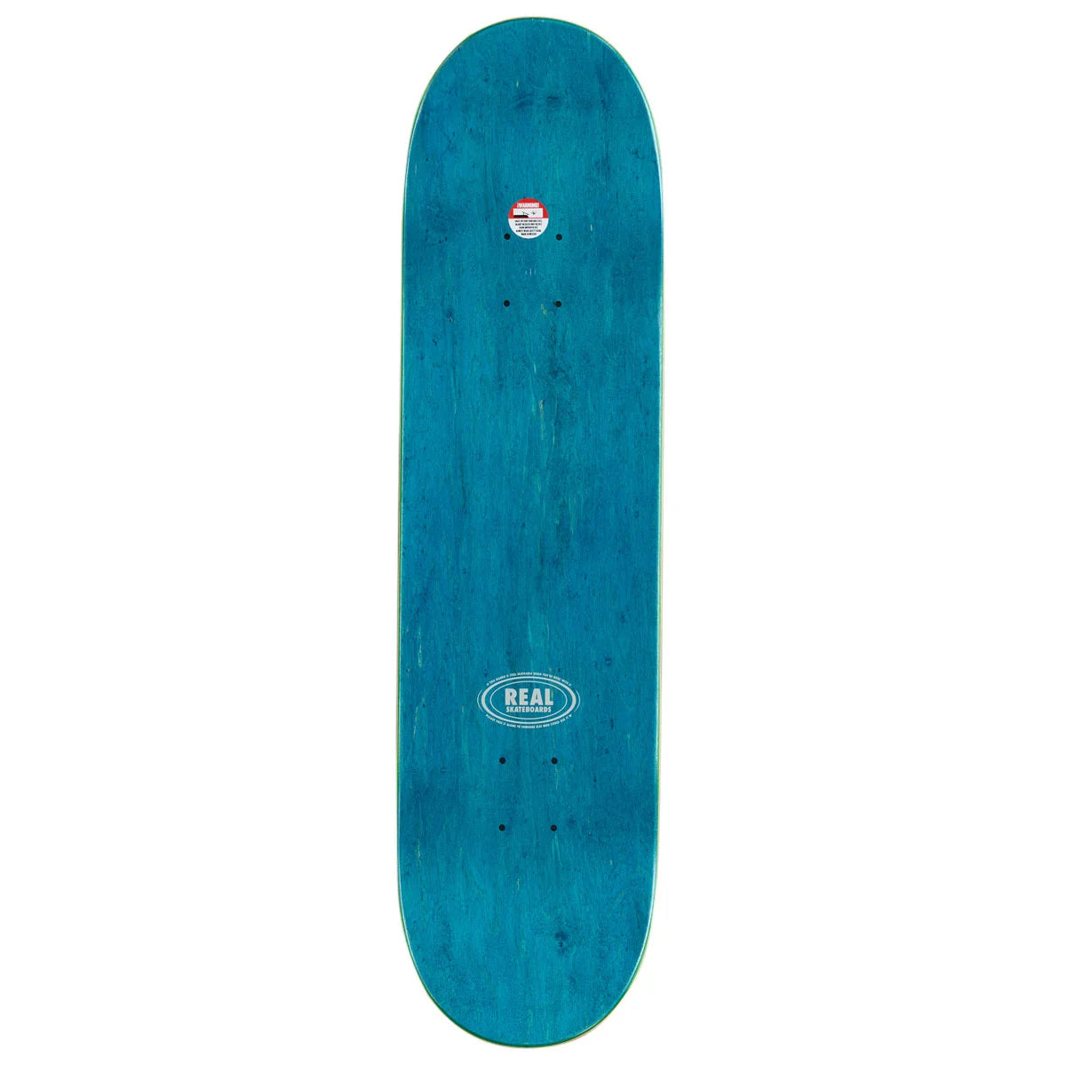 A teal blue skateboard deck with a natural wood grain texture, featuring a white oval 'REAL' logo in the center and a small sticker near the nose, shown against a plain white background.