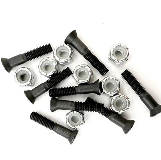 Set of black and silver screws on a white background
