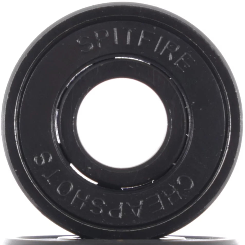 Black skateboard bearings with 'Spitfire' branding on a white background