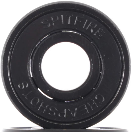 Black skateboard bearings with 'Spitfire' branding on a white background