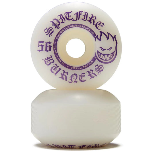 Two Spitfire Burners 56mm skateboard wheels stacked vertically on a white background, featuring purple gothic lettering and the iconic grinning snake logo.