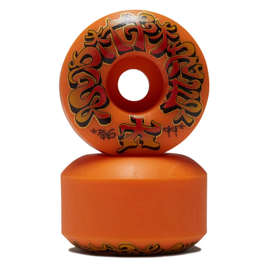 Two orange longboard skateboard wheels stacked vertically on a white background, featuring stylized black and red graffiti-style graphics on the top wheel.