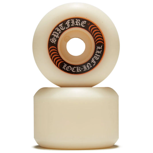 Two cream-colored Spitfire Lock-In Full skateboard wheels stacked vertically on a white background.