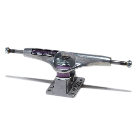 A single skateboard truck with a silver metal body and purple accents, shown on a plain white background with a soft shadow.