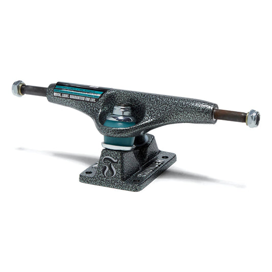 Skateboard truck with a speckled gray finish on a white background