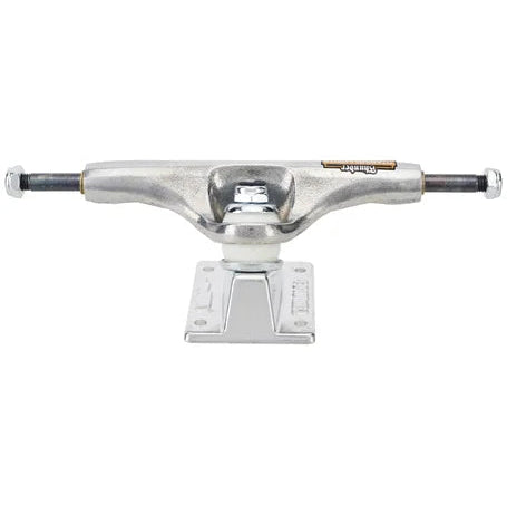 Skateboard truck with silver metal finish on a white background