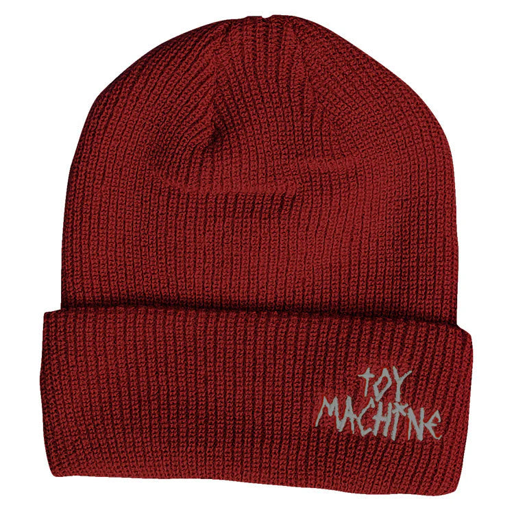 Red beanie with 'Toy Machine' logo on a white background