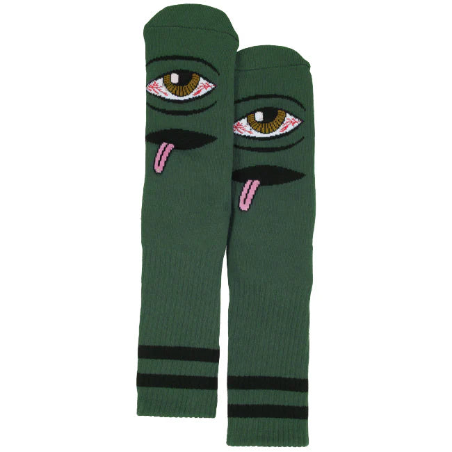 Green socks with eye and tongue design on a white background