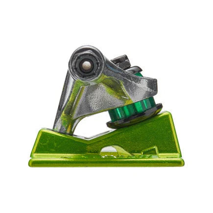 Green and silver metal component on a white background